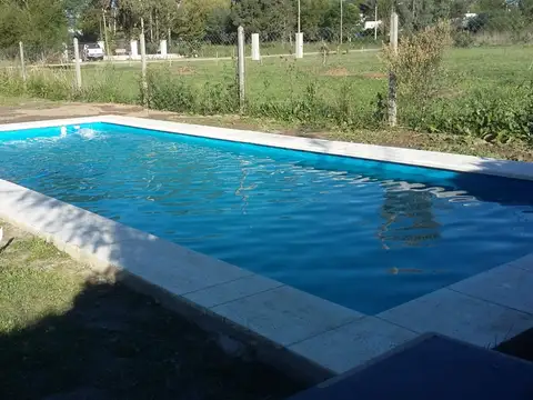 SOBRE LOTE DE 20 X 50 UNA CABAÑA DE 75 MTS 2 TOTALMENTE EQUIP PILETA PARRILLA Y PREPARADO PARA 2 MAS