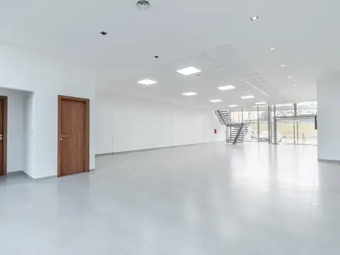 Edificio corporativo premium de 1225m2 sobre Au. Panamericana, límite de Munro y Martínez.
