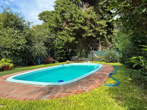 Venta casa en Funes con jardín y pileta