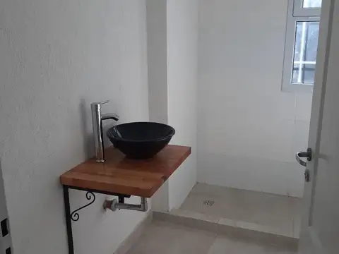 Departamento en venta en el centro de  Pilar con cochera