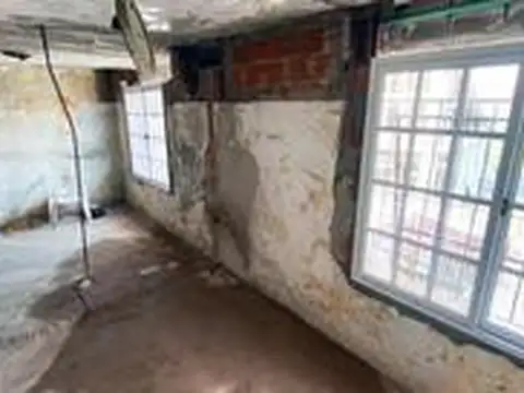 Edificio 2 locales y 7 departamentos