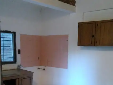 Casa de pasillo con amplio jardin