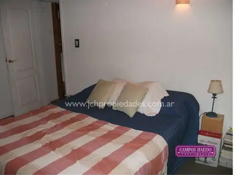 CASA DE TRONCOS EN ALTOS DE MANZANO - VILLA ANGOSTURA ( Códi