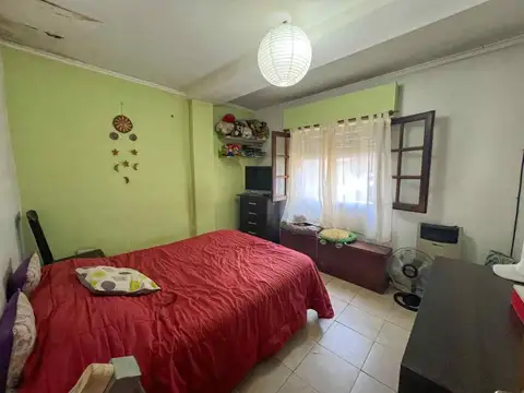 CASA 3 AMBIENTES JARDIN Y COCHERA A REFACCIONAR