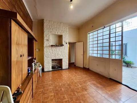 Departamento de pasillo 1 dormitorio y comodín con patio y terraza, Barrio Martin, Rosario