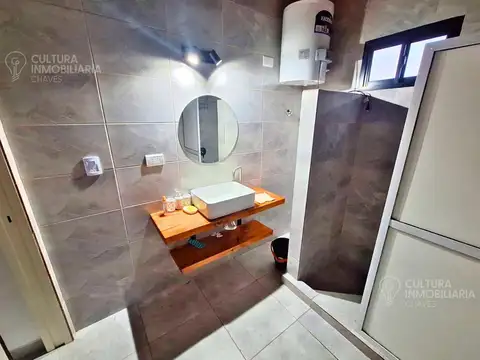 Juana M. Torino, entre F. de Magallanes y Benito Perez Gallo