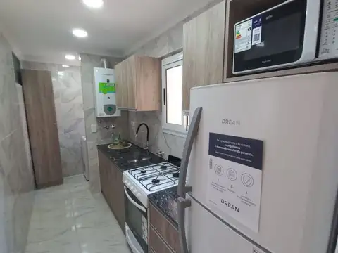 Dos ambientes lateral abierto 