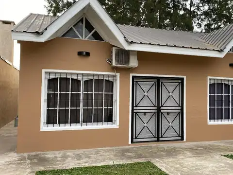 Casa con garage y departamento a terminar