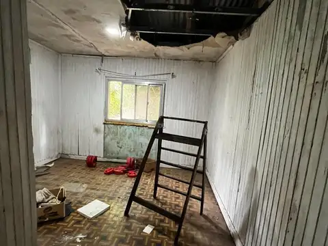 Amplio Lote c/mejoras cerca de Plaza Washington