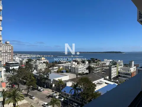 Piso alto con vista al puerto