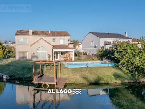 Casa a la laguna con 4 dormitorios en venta y/o alquiler en Barrancas del Lago.