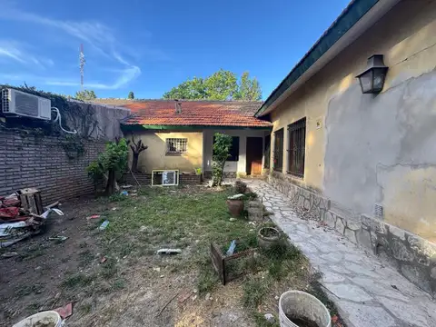 VENTA DE CASA  EN UNA PLANTA SOBRE AMPLIO LOTE EN MUÑIZ