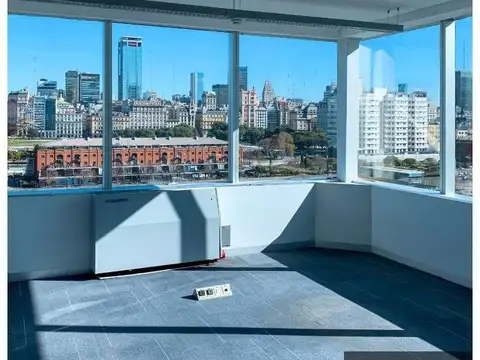 Oficina en venta con vista al río – Planta libre de 391 m² en torre Triple A, con 2 cocheras en Puerto Madero 