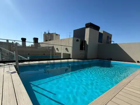 VENTA CUATRO AMBIENTES CON DEPENDENCIA - COCHERA FIJA CUBIERTA EN PB