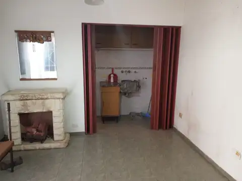 Departamento de pasillo de 2 dormitorios en calle Garibaldi al 500  de Rosario.(zona sur)