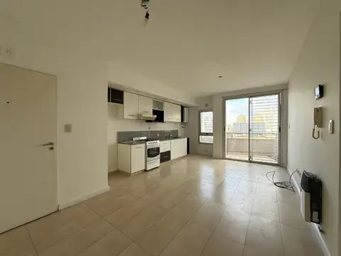 2 AMBIENTES AL FRENTE , CON COCHERA , BALCON ,PARRILLA, SUM , APTO PROFESIONAL