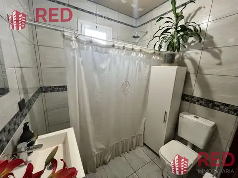Casa 4 ambientes con 2 baños