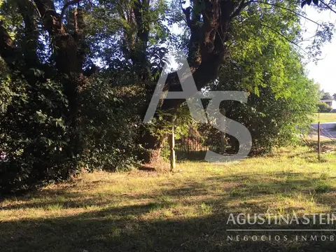 Terreno con casa en construcción