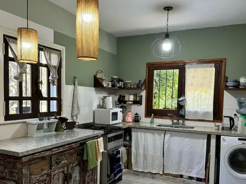 Casa 2 ambientes con 2 baños