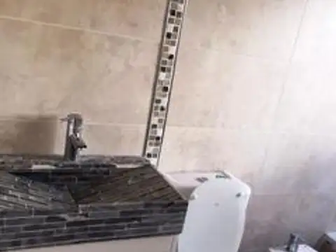 monoambiente al frente balcon abierto con cochera abierta