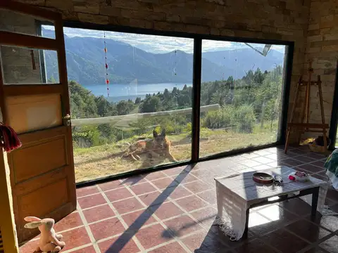 Casa con vista al Lago y al Atarcdecer en Meliquina