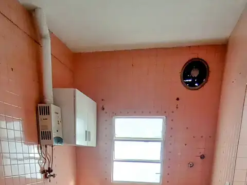 Depto Tipo Casa en Venta en Villa Dominico, USD 55.000