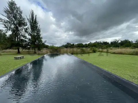 Fraccion con casa, pileta y galpon calle 144 entre 446 y Arroyo Carnaval. Los porteños