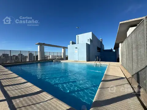 Moderno depto.2 amb. Amplios balcones c/ Vista.Cochera fija 2 autos. Edificio c/piscina, sum y segur