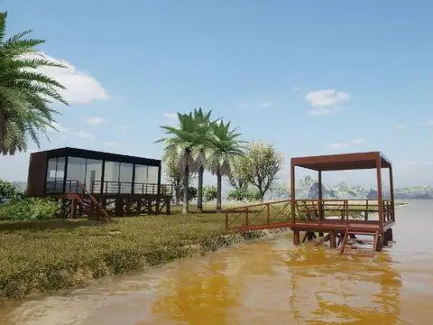 Casa sobre el agua en Guayraca – 800 m², doble costa, deck y muelle