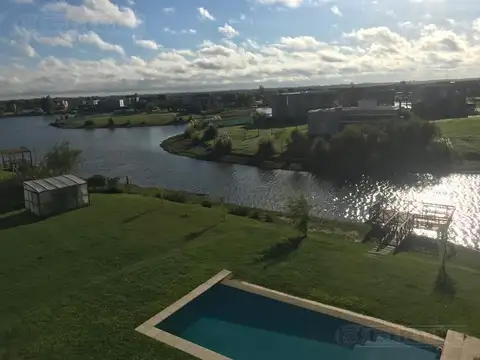 Casa en venta a laguna central Canton Norte 370.000 PG pile sauna