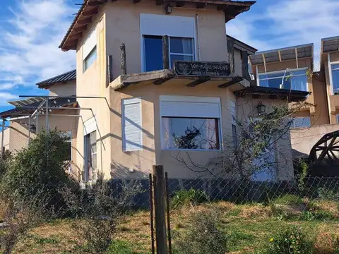 Naposta e/ Avenida Tres Picos y La Gruta