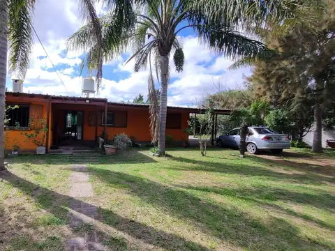 VENTA AMPLIO TERRENO 26 X 37,50 CON CASA CONSTRUIDA