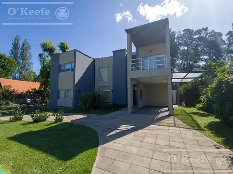 Casa en Abril Country Club fondo verde