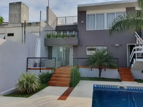 casa minimalista 5 ambientes con gge para varioa autos , pileta gym y gge varios autos ..Excelente 
