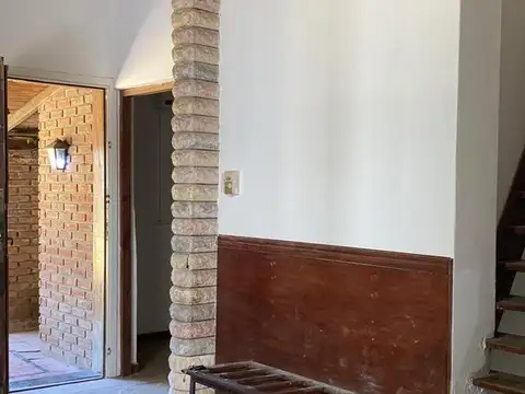 Casa sobre dos terrenos