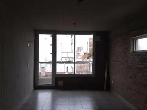 Departamento de dos dormitorios con cochera.