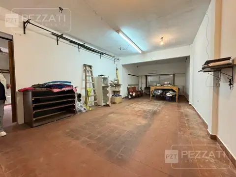 Edificio comercial  y vivienda