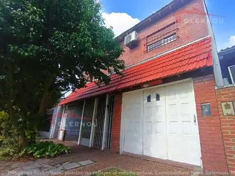 CASA TIPO CHALET 5 AMBIENTES GARAGE Y JARDIN TOMA PERMUTA