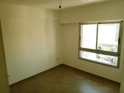 DEPARTAMENTO 2 AMBIENTES CON COCHERA. "A ESTRENAR". EDIFICIO CON PILETA, PARRILLA Y SUM.