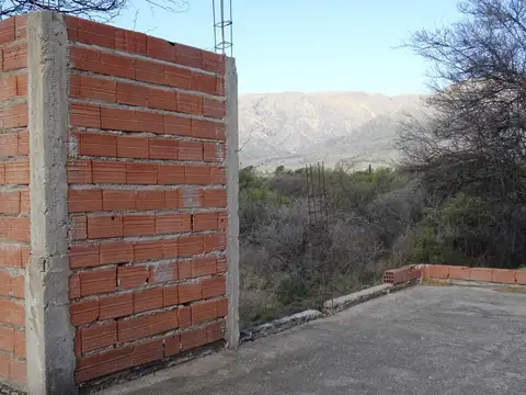 Casa a terminar sobre 2 terrenos en venta en Los Molles