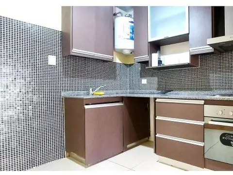 Monoambiente con patio o cochera