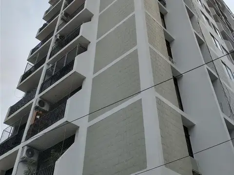 Departamento 1 ambiente en piso alto con vista panorámica, living comedor, cocina separada, lavadero