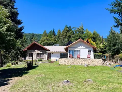 Hermosa casa vista al lago y jardín en Bariloche