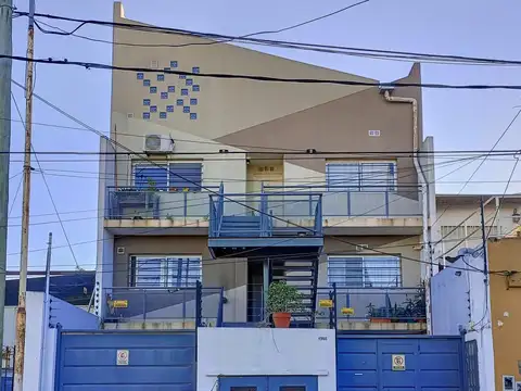 DEPARTAMENTO DE 2 AMBIENTES EN VENTA EN SANTOS LUGARES CON COCHERA DESCUBIERTA