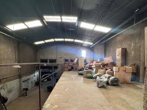 GALPON EMPLAZADO EN DOS LOTES DE TERRENO