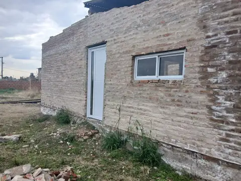 TERRENO CON CONSTRUCCION EN TEMBEI PORA