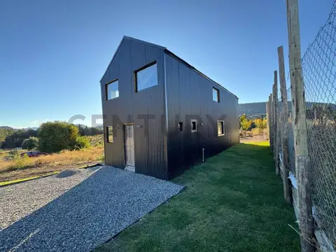 VENTA CASA SAN MARTIN DE LOS ANDES . Dúplex Moderno con Encanto Patagónico y Vista Abierta en San Ma