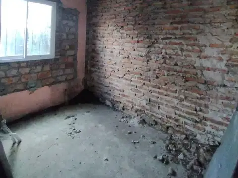 Terreno con casa a terminar. Excelente oportunidad