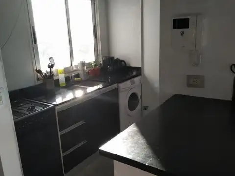 MONOAMBIENTE CON COCHERA DESCUBIERTA