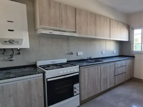 Venta Departamento 2 dormitorios  tipo casa en Arroyito - Amplio Patio Exclusivo. Estrenar Rosario